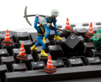 computer repair concept - workers repairing keyboard