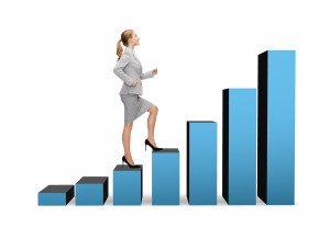 business and education concept - smiling businesswoman stepping
